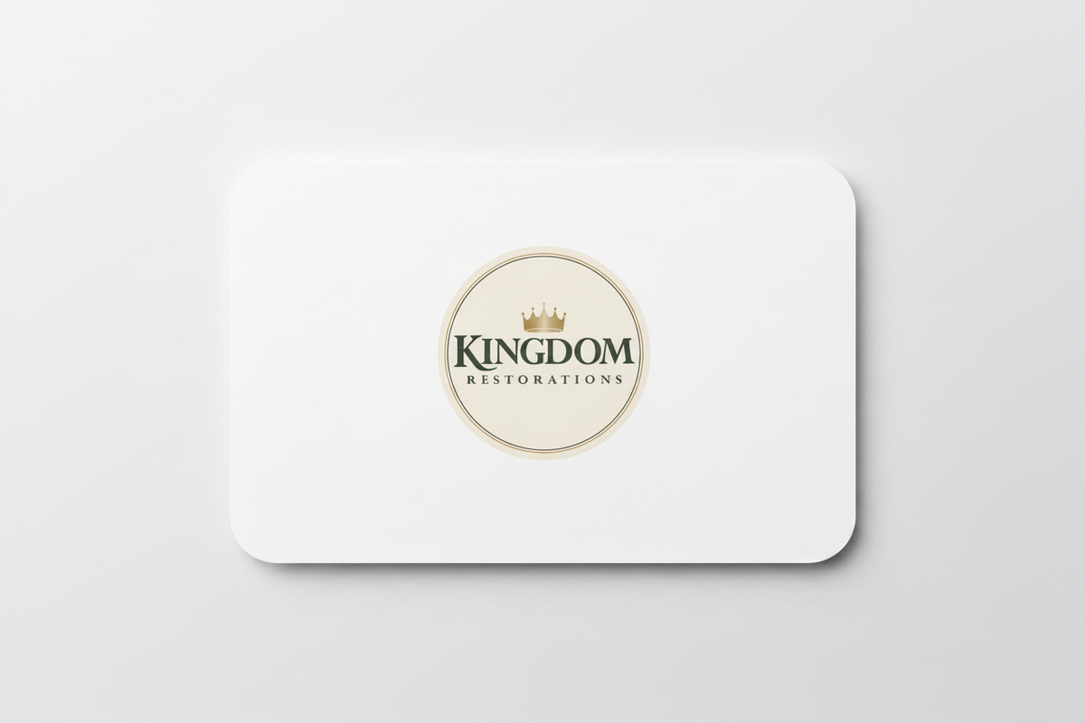 Logo of Kingdom Restorations with a crown on a white gift card.